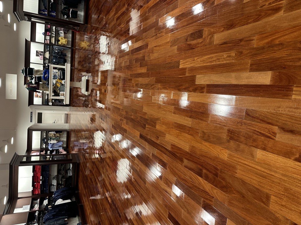 Freshly waxed commercial floor with a deep, even gloss